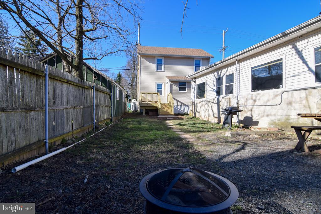 1071 West Bristol Road Warminster, PA 18974 - Photo 33 of 34 a view of a backyard with wooden fence