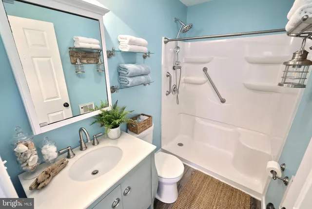 an aerial view of a house with a lake view