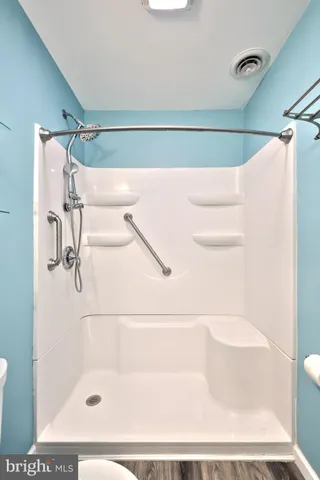 a view of an outdoor space and tennis court