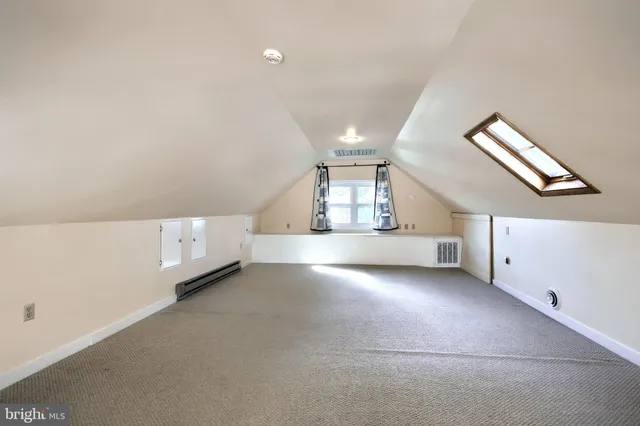 a view of swimming pool and trees in the background