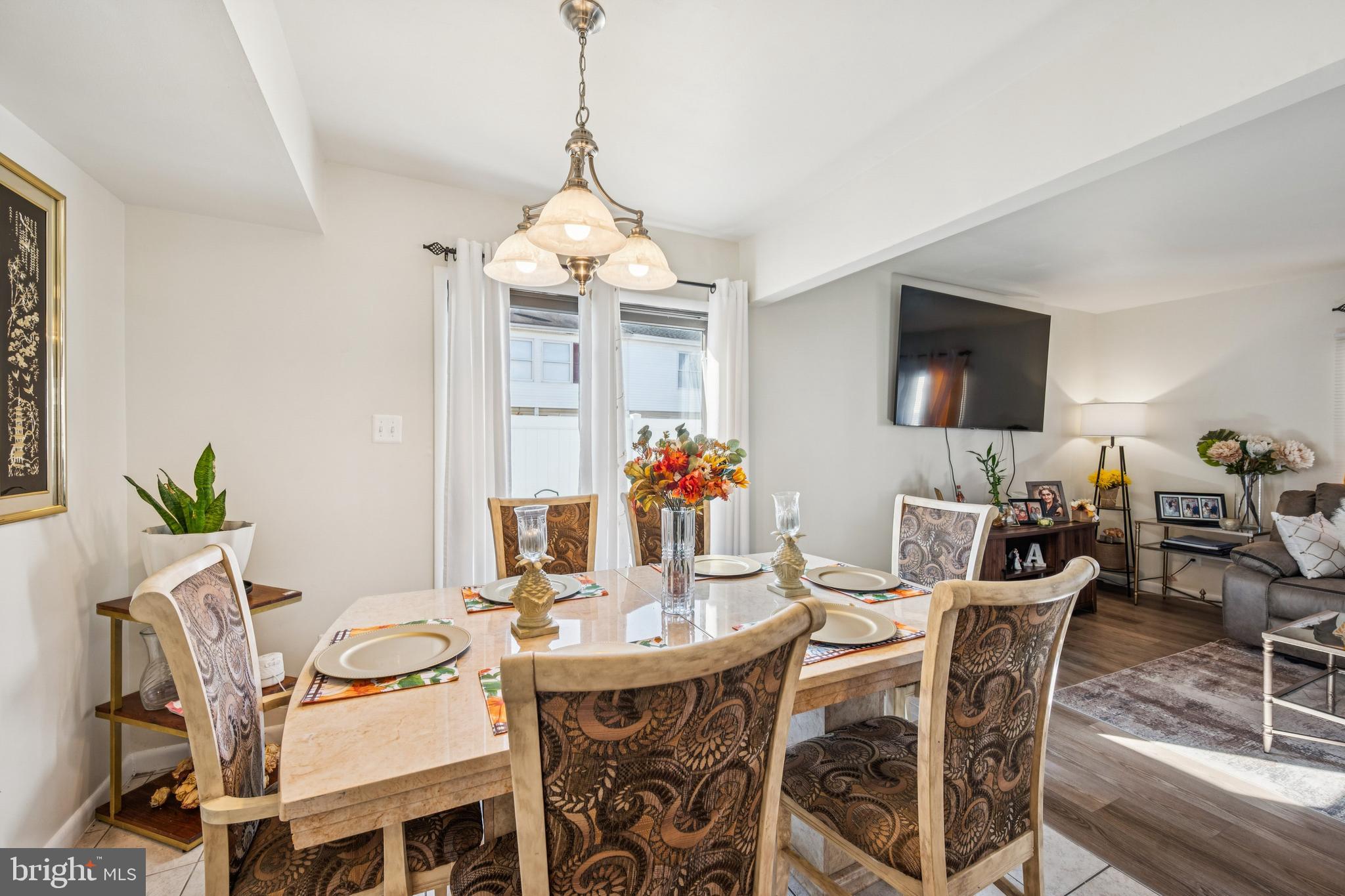 7 Lennox Court Sicklerville, NJ 08081 - Photo 11 of 25 a view of a dining room with furniture window and wooden floor