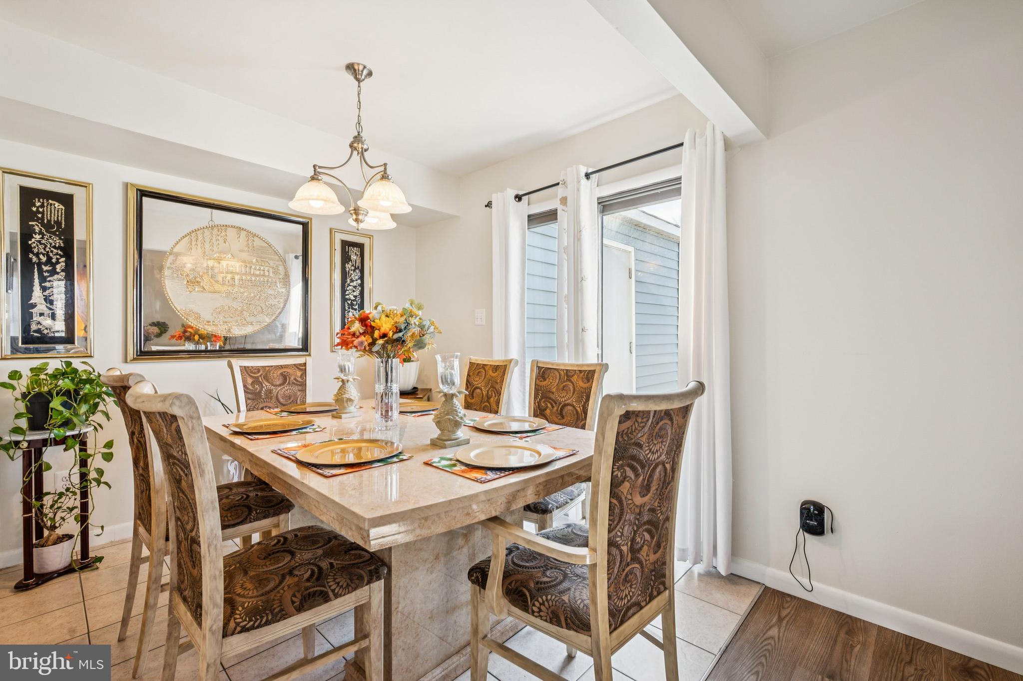7 Lennox Court Sicklerville, NJ 08081 - Photo 12 of 25 a view of a dining room with furniture wooden floor and chandelier