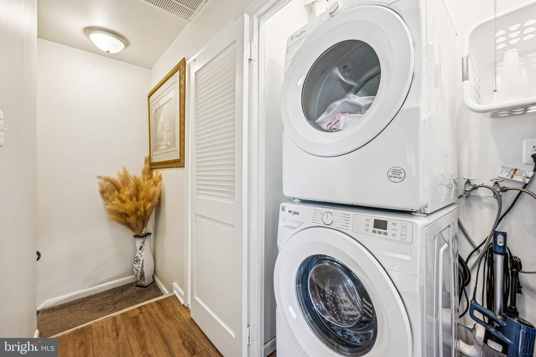 7 Lennox Court Sicklerville, NJ 08081 - Photo 24 of 25 a view of a storage and utility room with washer and dryer