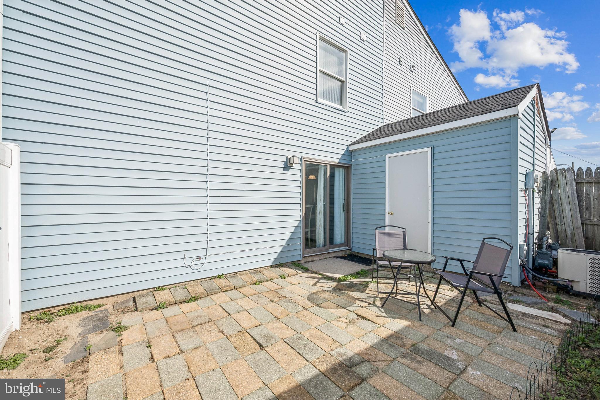 7 Lennox Court Sicklerville, NJ 08081 - Photo 25 of 25 a view of a patio with a table and chairs and ice snow