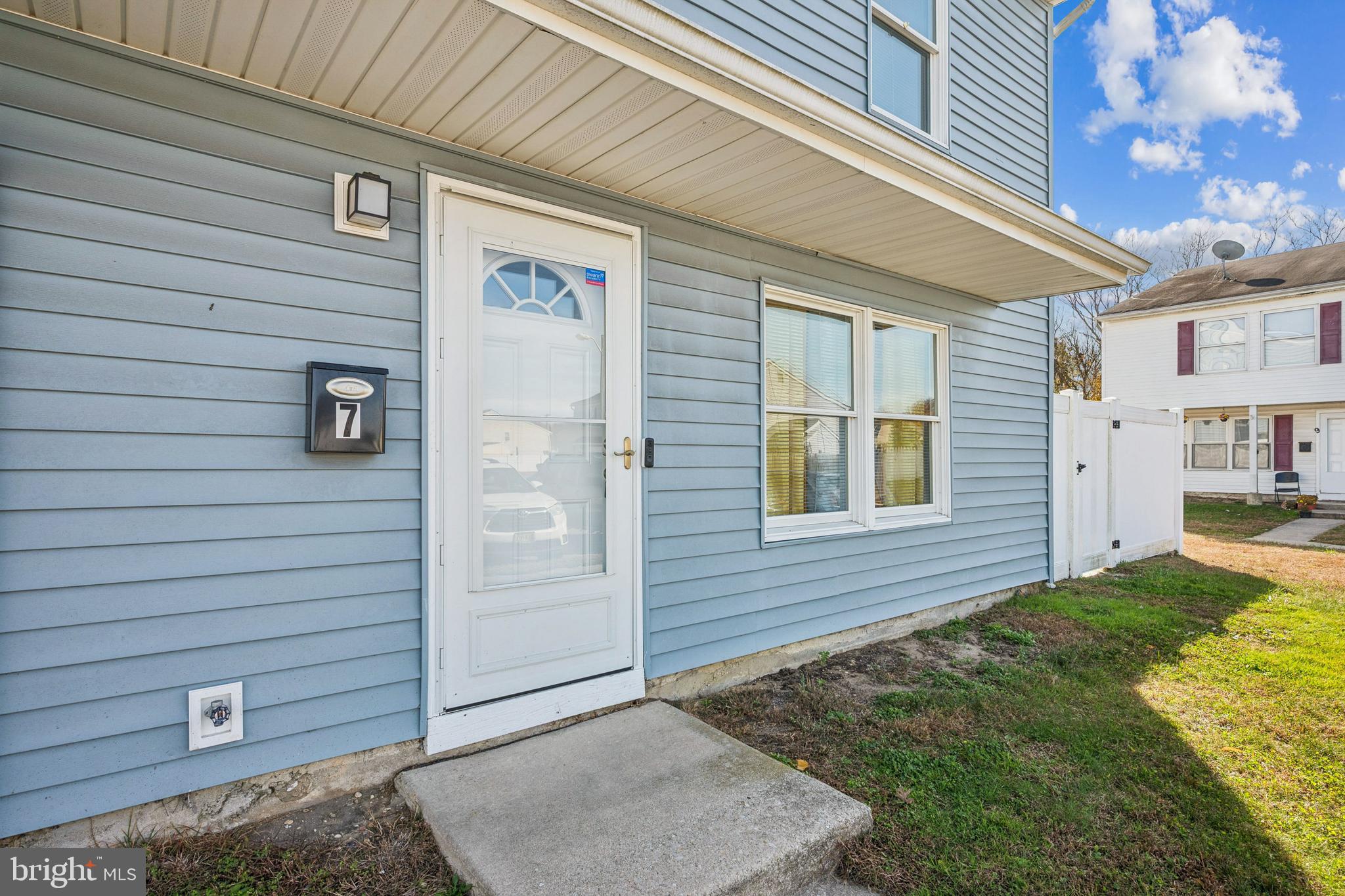 7 Lennox Court Sicklerville, NJ 08081 - Photo 3 of 25 a front view of a house with a yard