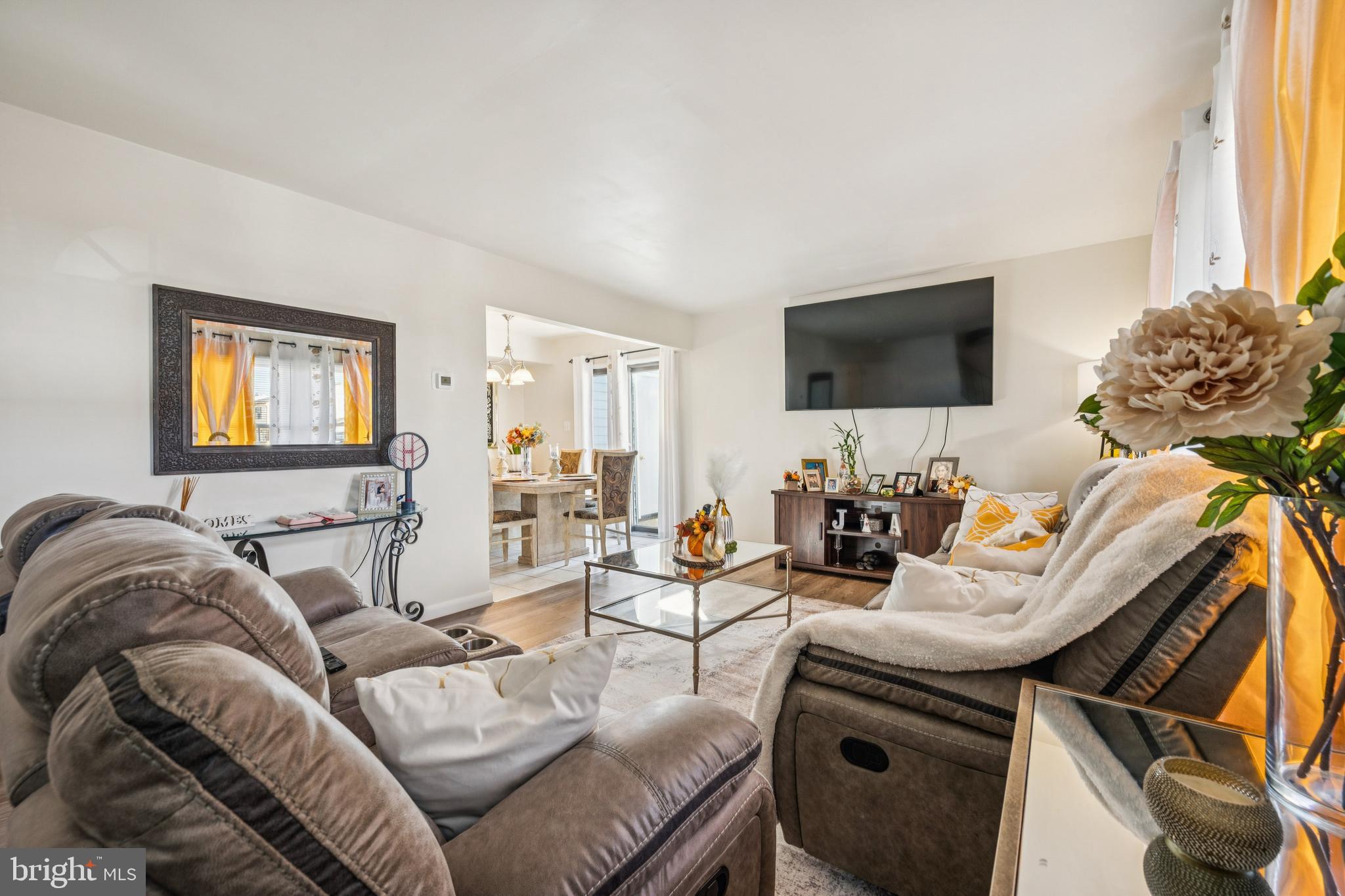 7 Lennox Court Sicklerville, NJ 08081 - Photo 5 of 25 a living room with furniture and a flat screen tv