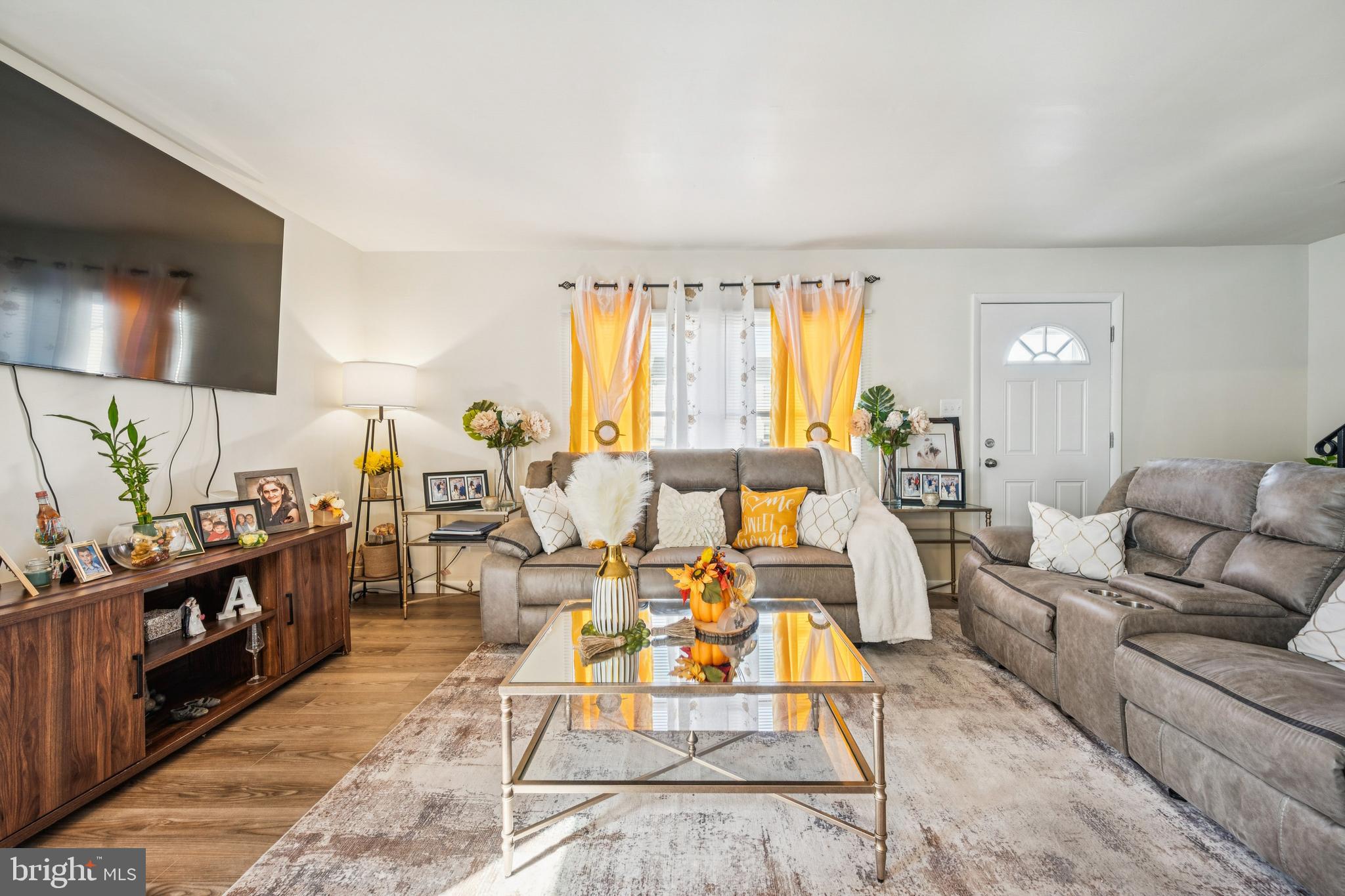 7 Lennox Court Sicklerville, NJ 08081 - Photo 6 of 25 a living room with furniture and a flat screen tv
