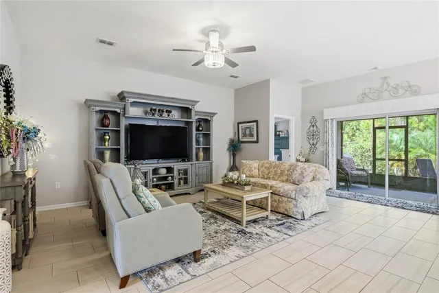 a bedroom with a bed and flat screen tv