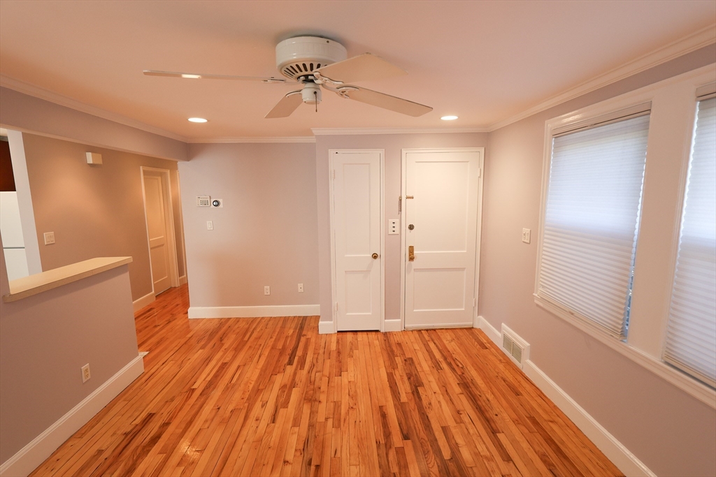 33 Paragon Road, Unit 1 Boston, MA 02132 - Photo 8 of 20 a view of wooden floor in an empty room with a window