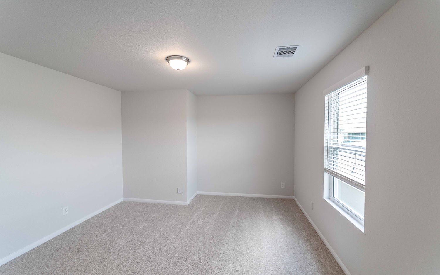 4315 Maple Root Lane Pinehurst, TX 77362 - Photo 11 of 27 an empty room with windows