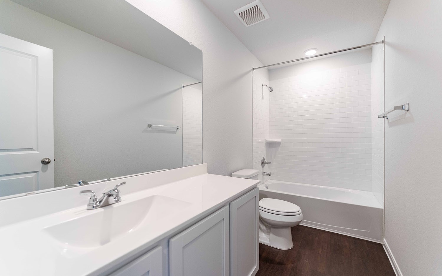 4315 Maple Root Lane Pinehurst, TX 77362 - Photo 13 of 27 a bathroom with a sink a toilet and shower