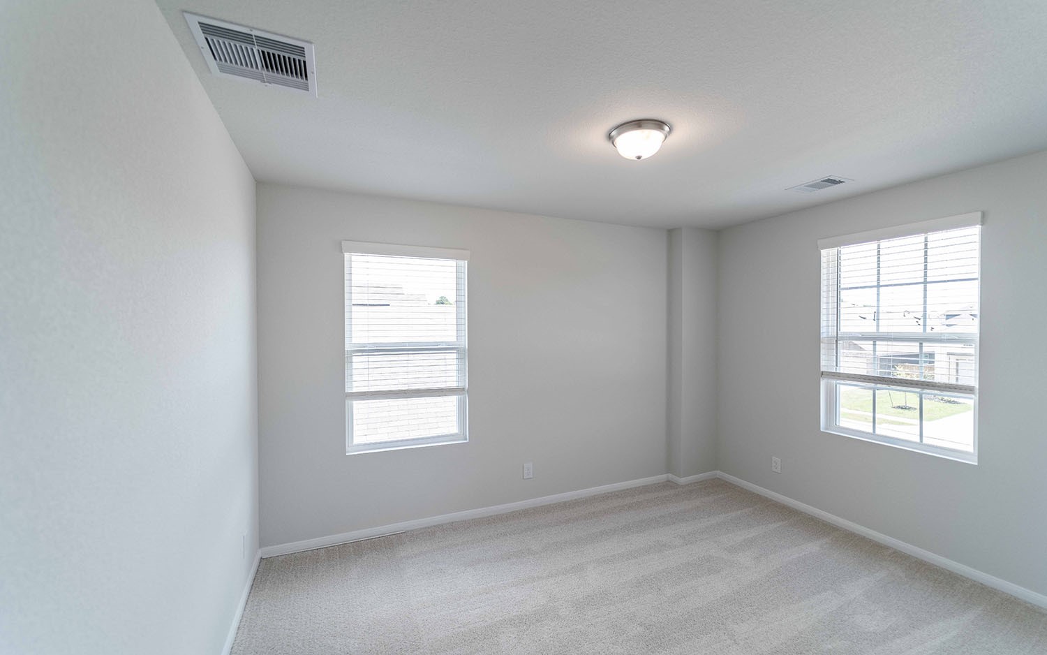 4315 Maple Root Lane Pinehurst, TX 77362 - Photo 15 of 27 an empty room with windows