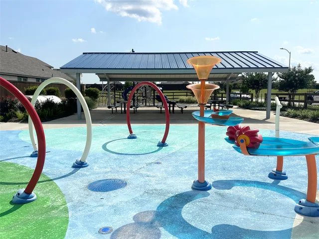 a view of a swimming pool outdoor seating