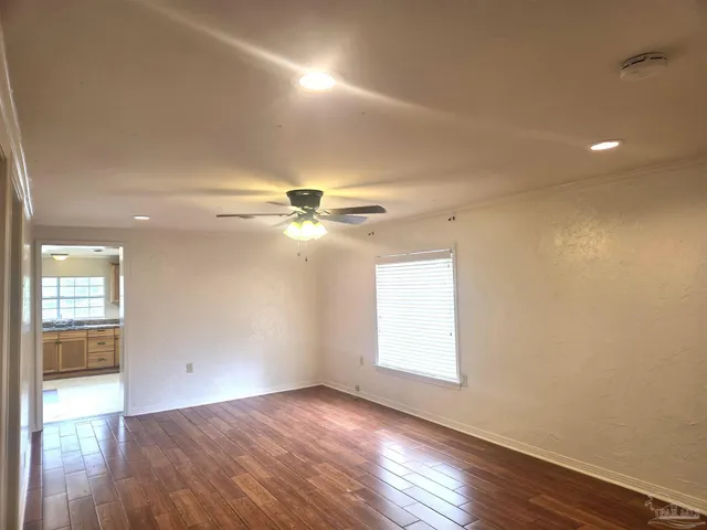 a kitchen with a stove and a sink