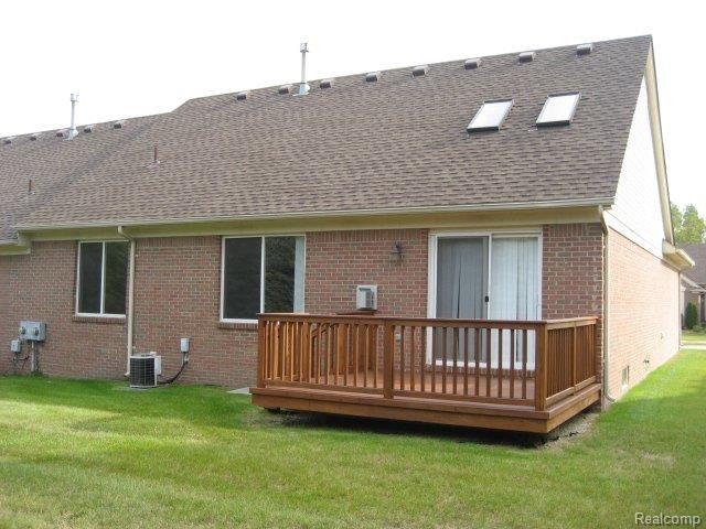 8083 Huntington Ridge Court, Unit 18 Washington, MI 48094 - Photo 3 of 25 8083_Deck.jpg