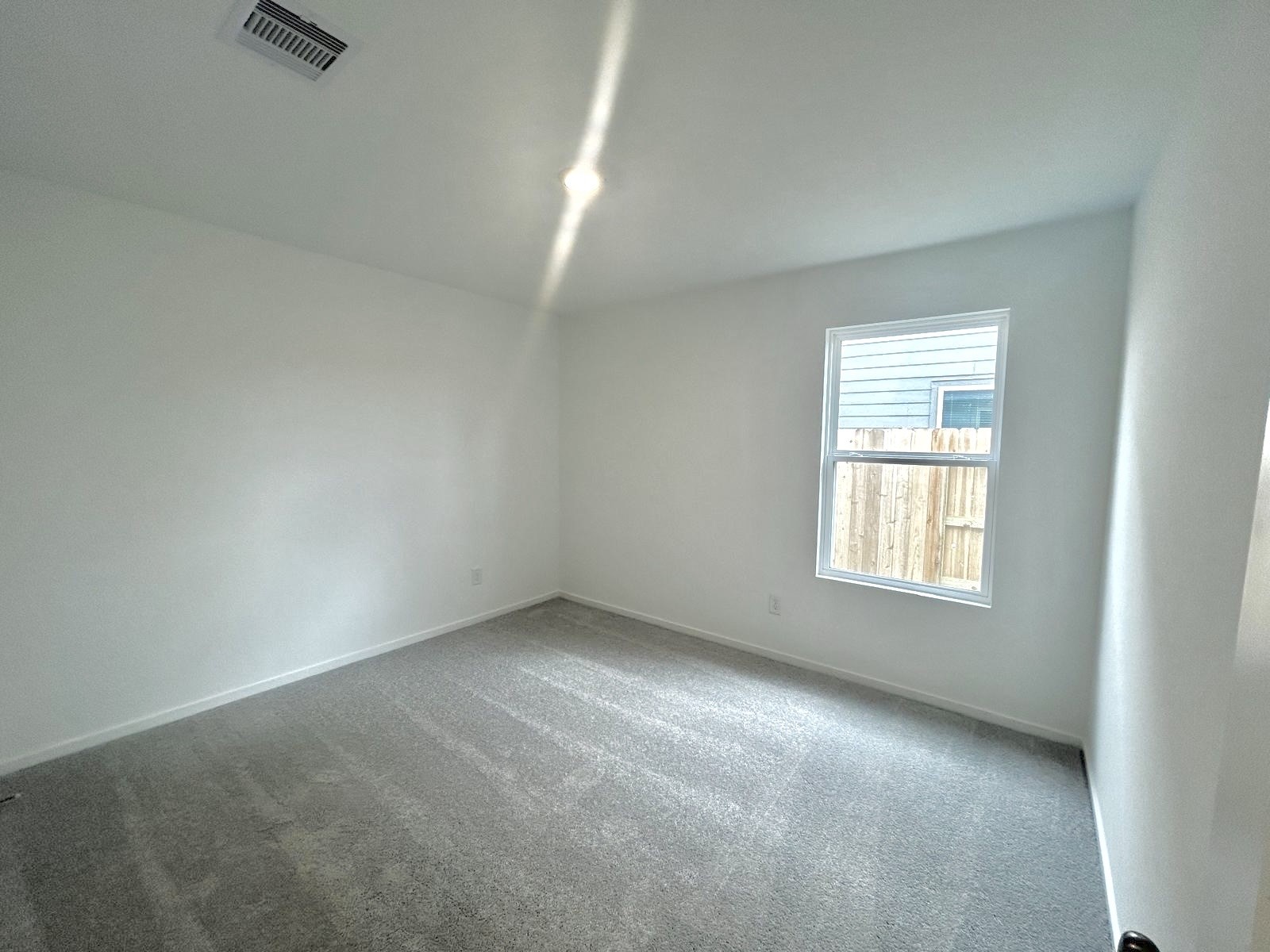 438 Southern Magnolia Way Magnolia, TX 77354 - Photo 11 of 18 an empty room with a window