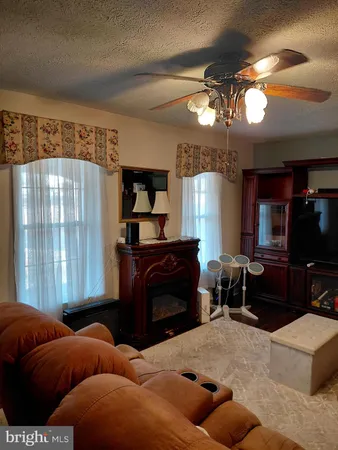 a kitchen with stainless steel appliances granite countertop a stove sink and cabinets
