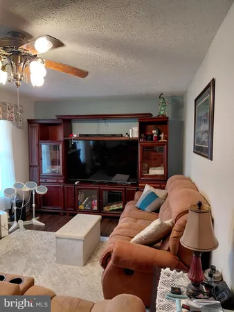 a kitchen with a sink cabinets and window