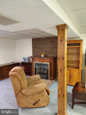 a room with furniture and a chandelier