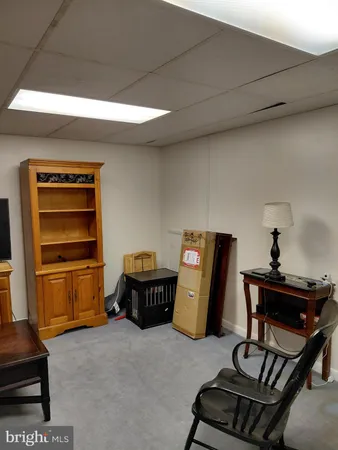 a room with furniture and a wooden floor