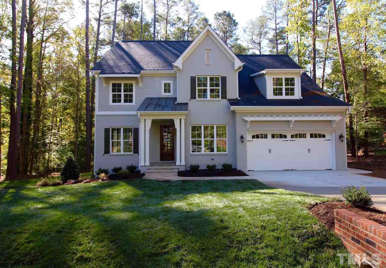 3013 Club Drive Raleigh, NC 27613 - Photo 1 of 25 a view of a yard in front of house