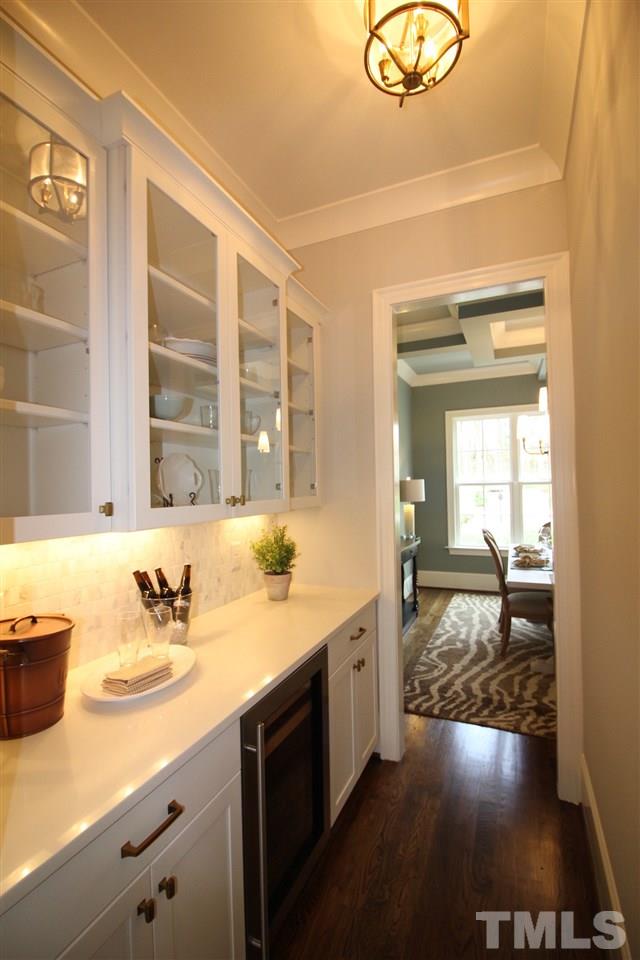 3013 Club Drive Raleigh, NC 27613 - Photo 4 of 25 a en suite bathroom with a sink and a window
