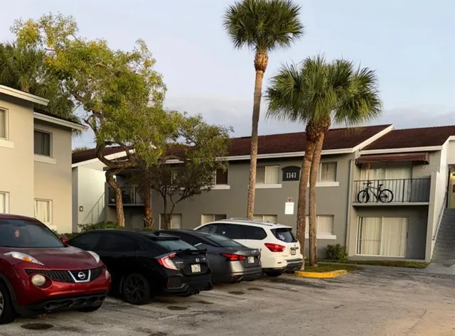 a car parked in front of a house