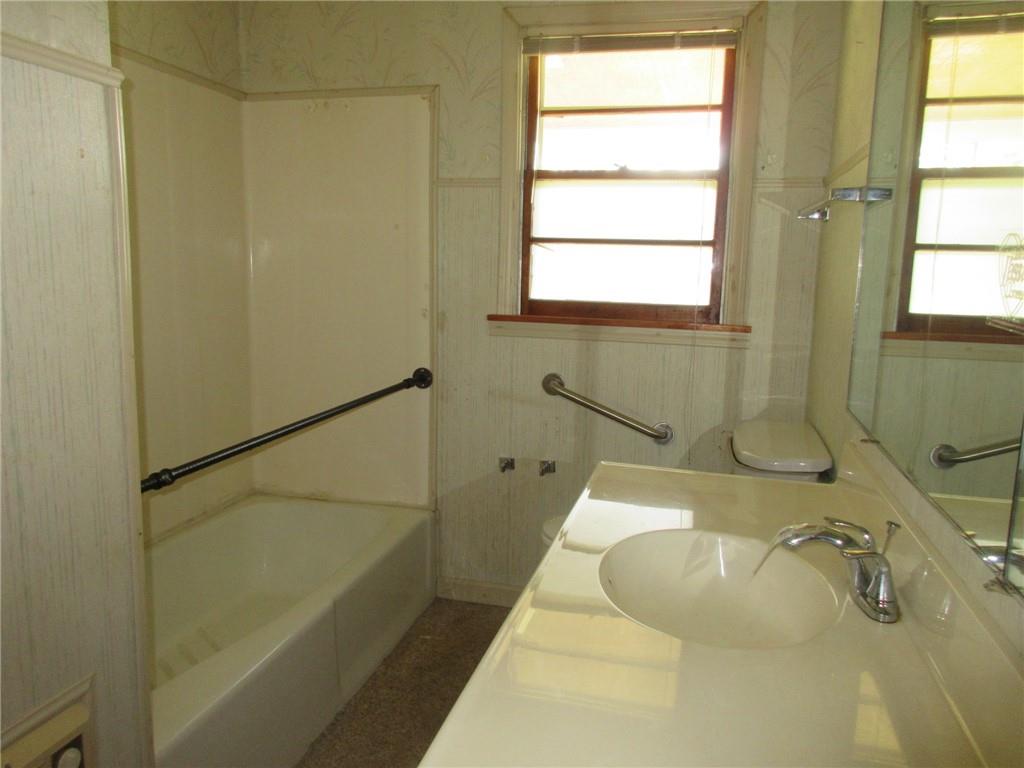 35 Pleasant Valley Road Claysville, PA 15323 - Photo 11 of 25 a bathroom with a tub a sink and a window