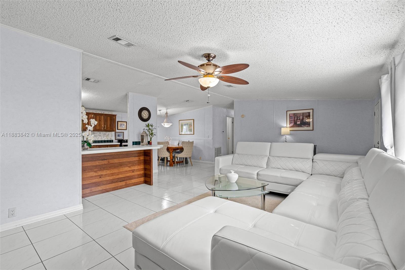 278 King Avenue Key Largo, FL 33037 - Photo 16 of 58 a living room with furniture kitchen view and a window