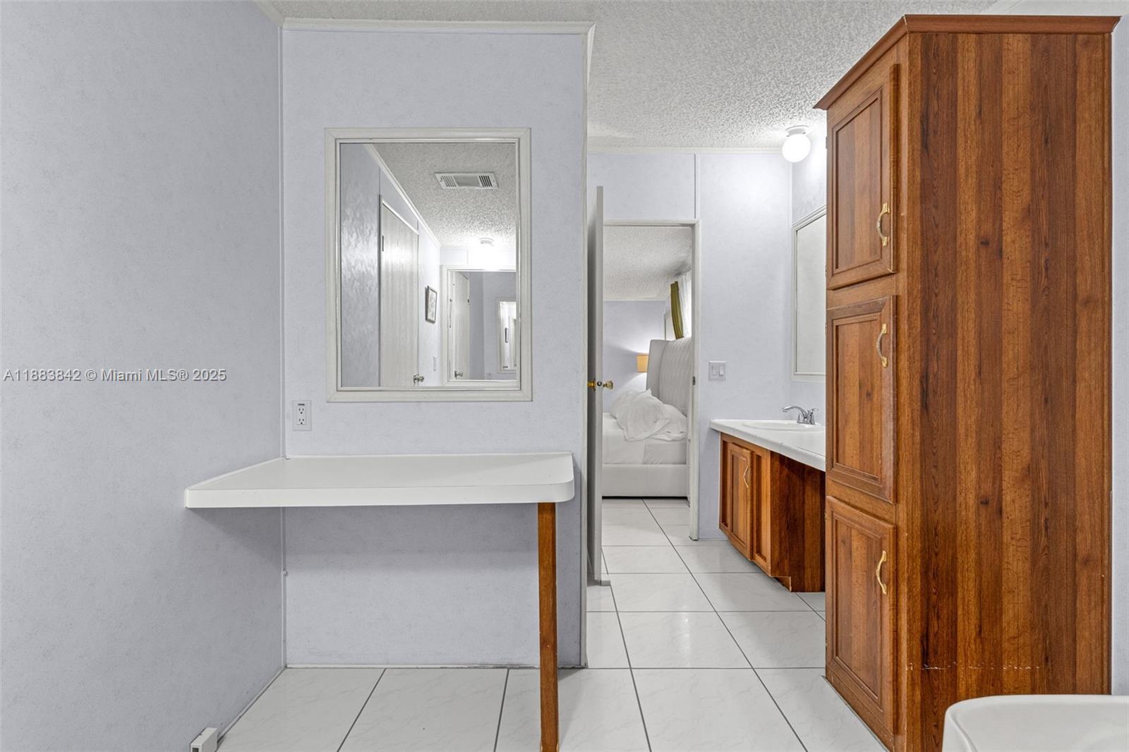 278 King Avenue Key Largo, FL 33037 - Photo 31 of 58 a view of a hallway with wooden floor