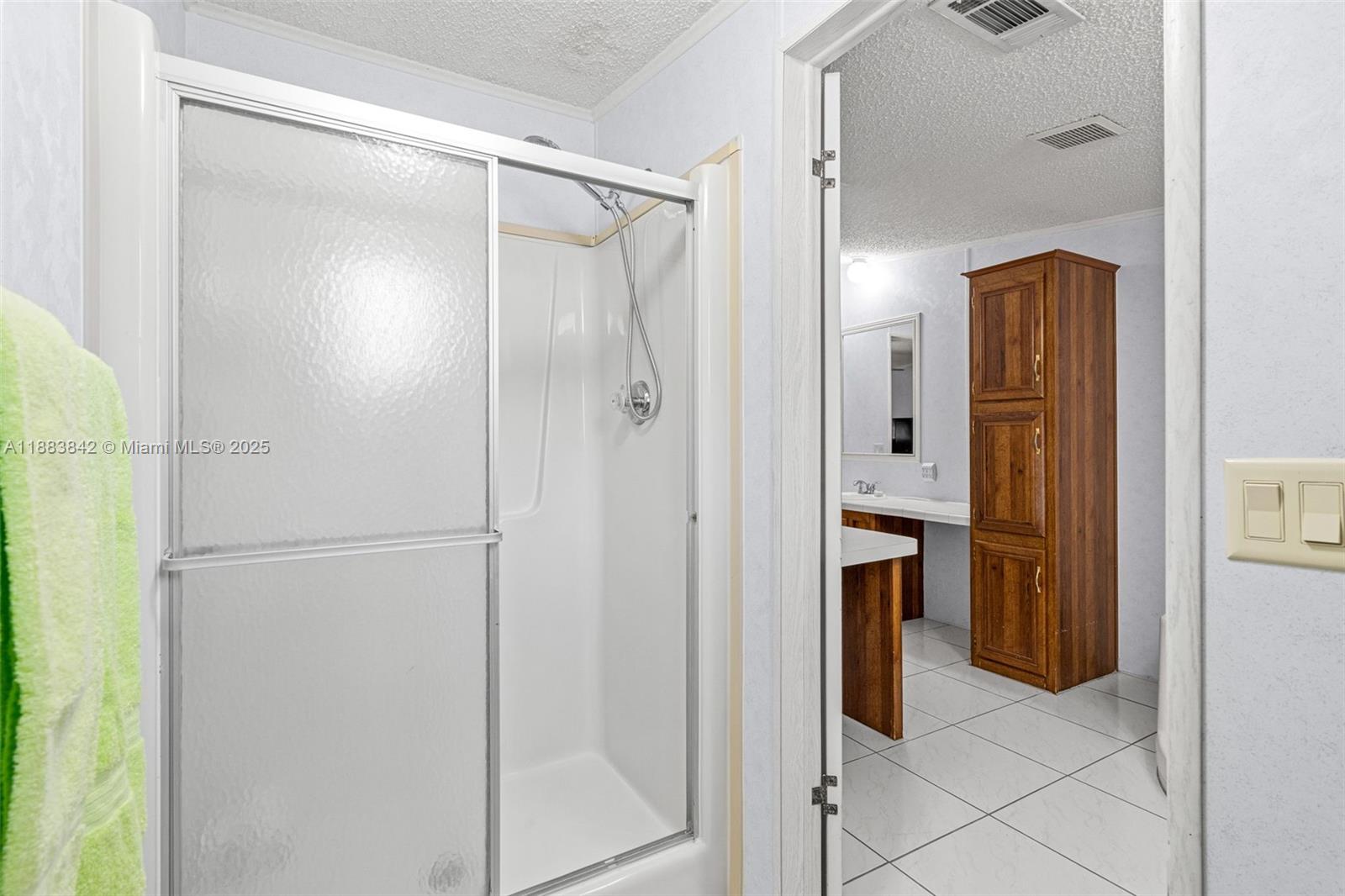 278 King Avenue Key Largo, FL 33037 - Photo 33 of 58 a bathroom with a shower and a glass door