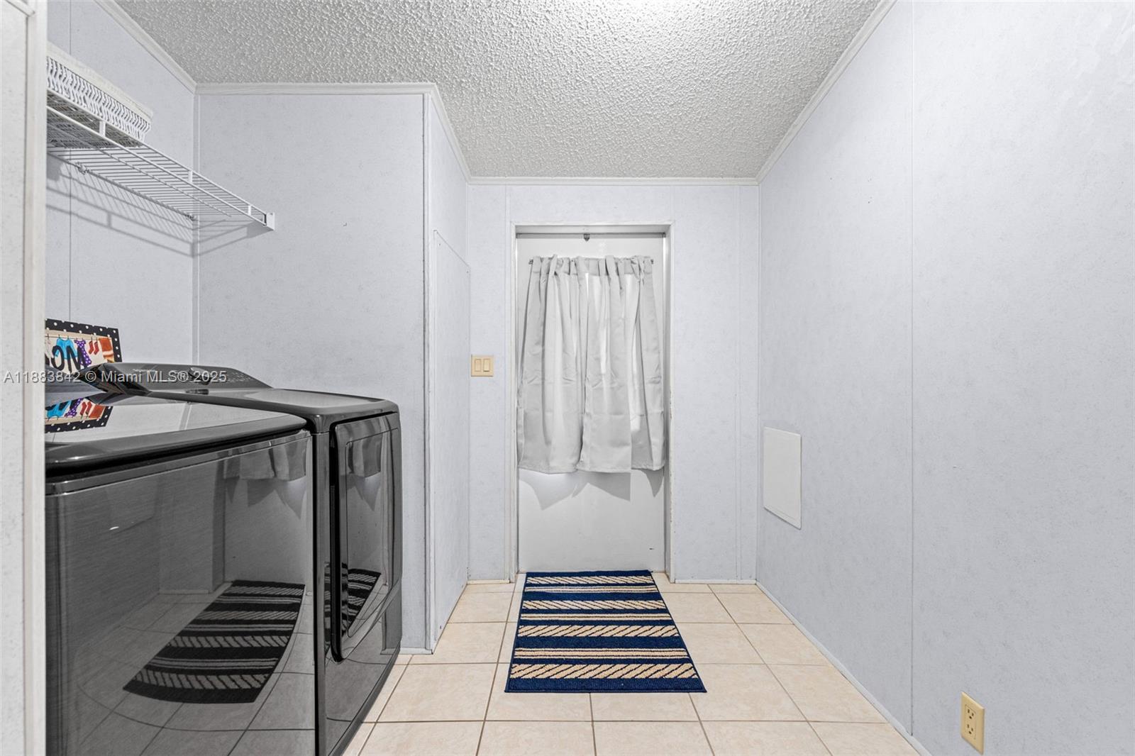 278 King Avenue Key Largo, FL 33037 - Photo 39 of 58 a utility room with dryer and washer