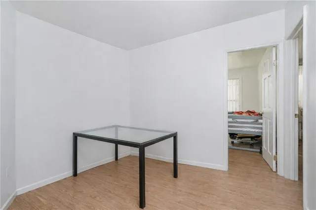 a room with a table and a mirror