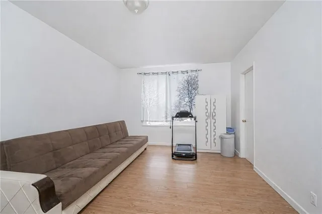 a bathroom with a sink toilet and mirror