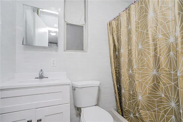 a view of bedroom with furniture and stairs