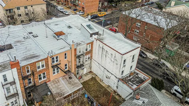 an aerial view of a city with lots of residential buildings