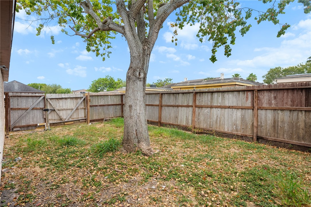 5009 Wingfoot Lane, Unit B Corpus Christi, TX 78413 - Photo 22 of 23 a view of outdoor space with garden