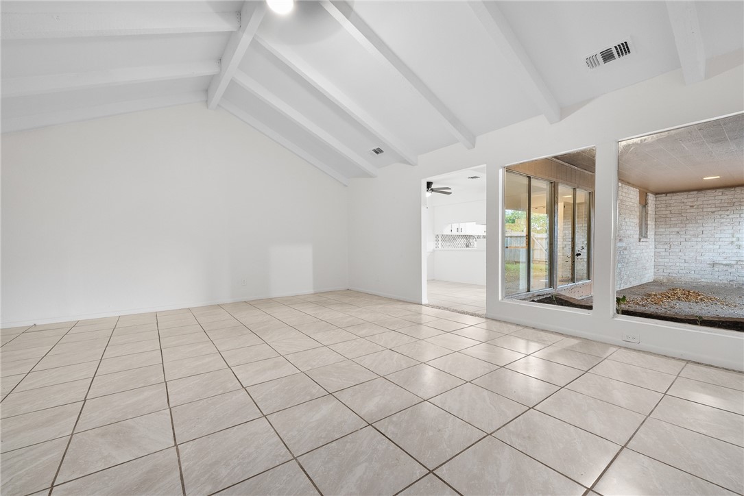 5009 Wingfoot Lane, Unit B Corpus Christi, TX 78413 - Photo 6 of 23 a view of an empty room and window
