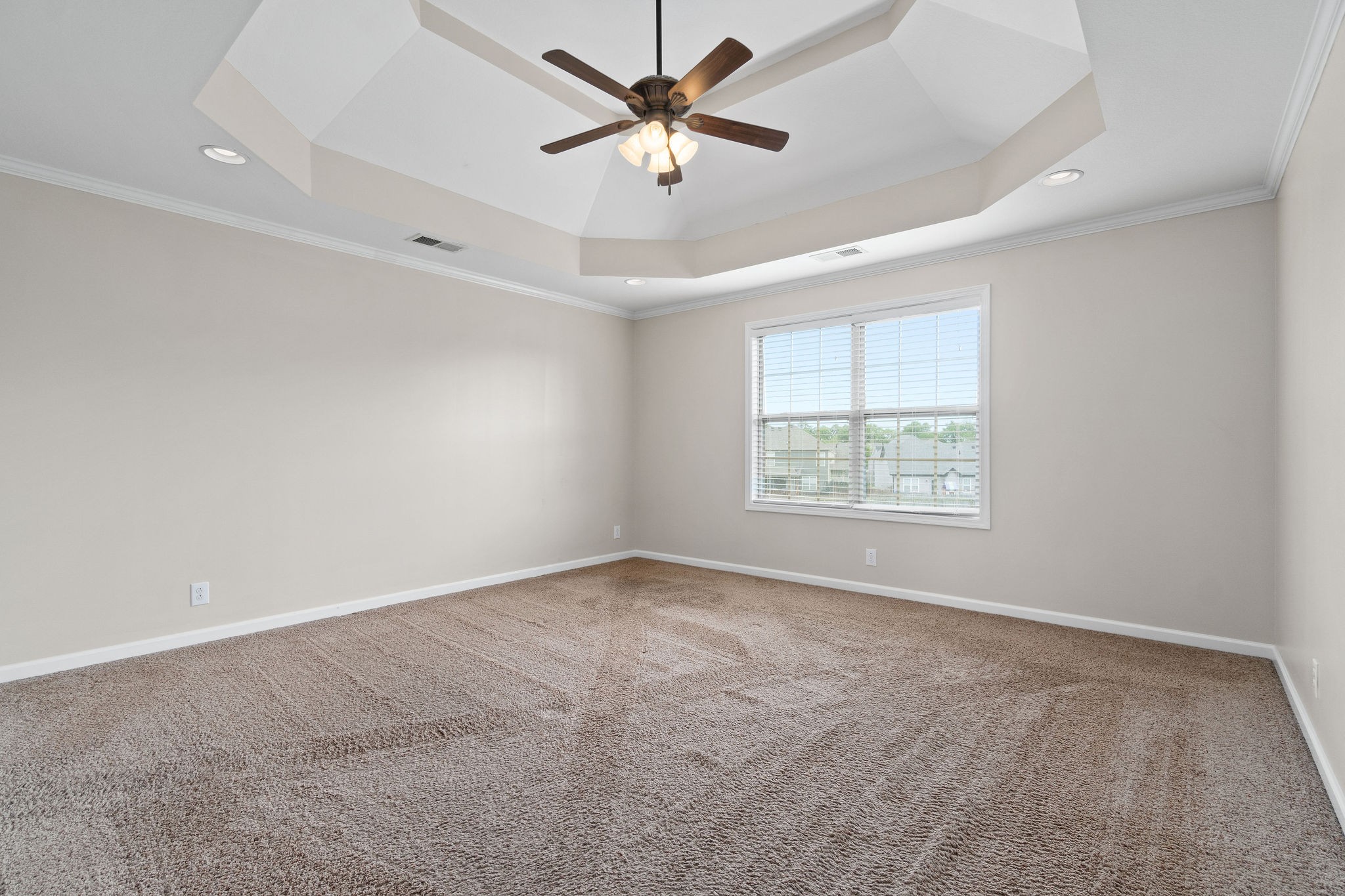 3768 Suiter Road Clarksville, TN 37040 - Photo 16 of 28 an empty room with windows and fan