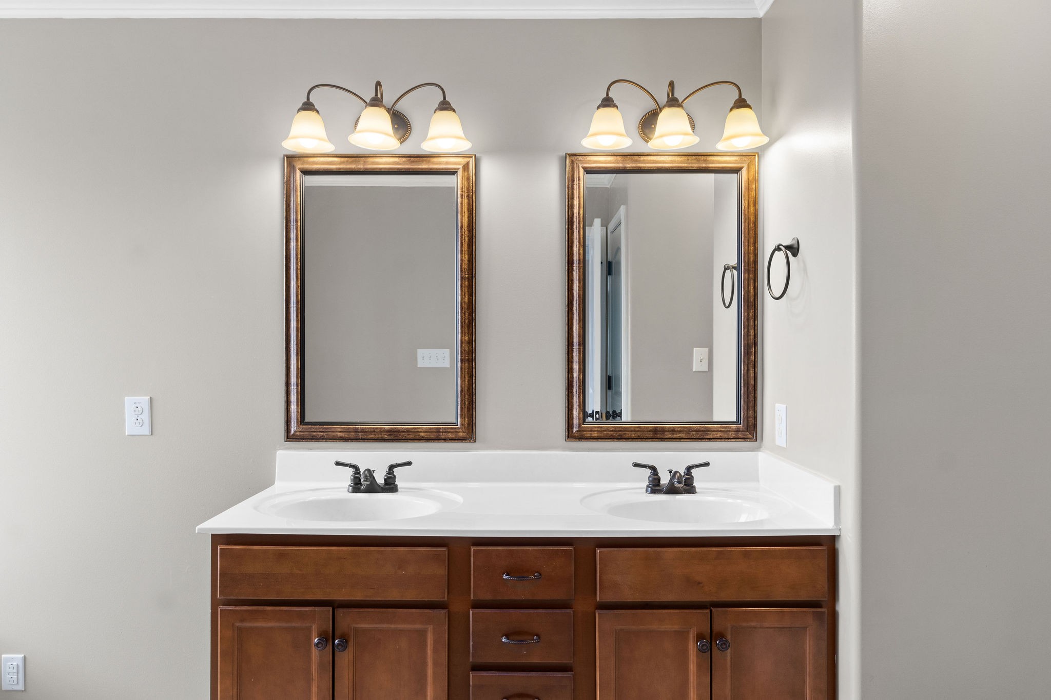 3768 Suiter Road Clarksville, TN 37040 - Photo 19 of 28 a bathroom with double vanity sinks and a mirror