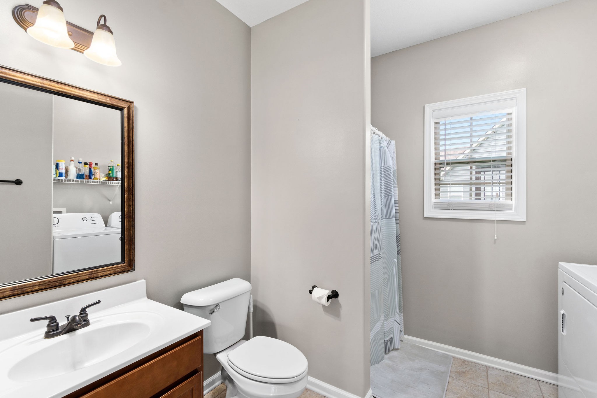3768 Suiter Road Clarksville, TN 37040 - Photo 25 of 28 a bathroom with a sink toilet and shower