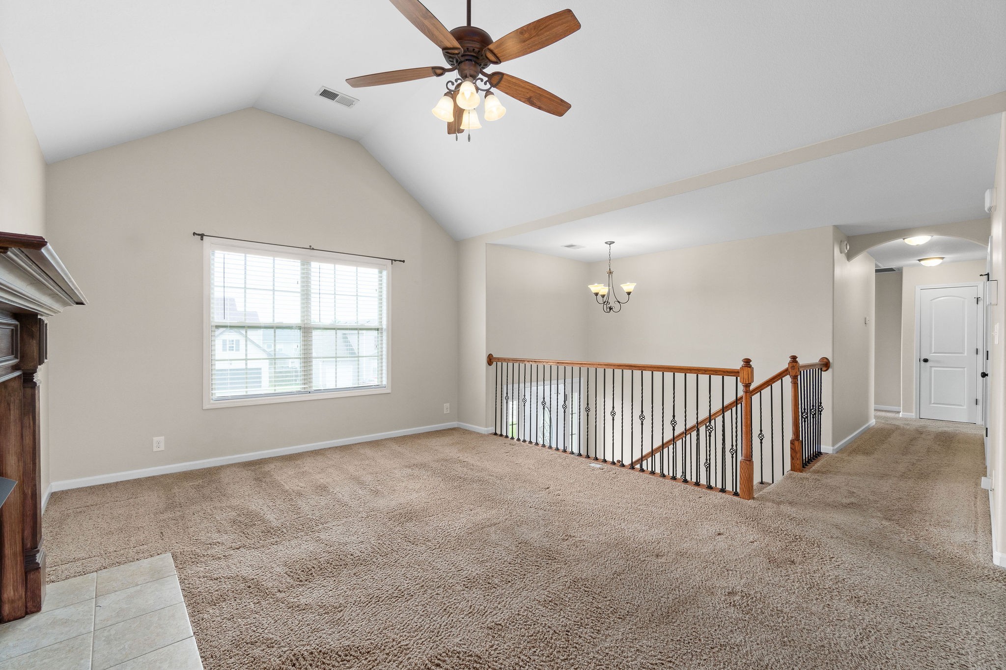 3768 Suiter Road Clarksville, TN 37040 - Photo 7 of 28 a view of a livingroom with a ceiling fan and window