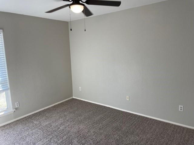 10616 Mellow Meadow Drive, Unit 43C Austin, TX 78750 - Photo 7 of 9 an empty room with a window and a fan