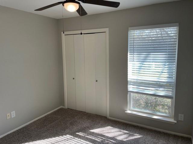 10616 Mellow Meadow Drive, Unit 43C Austin, TX 78750 - Photo 8 of 9 a view of an empty room with a window