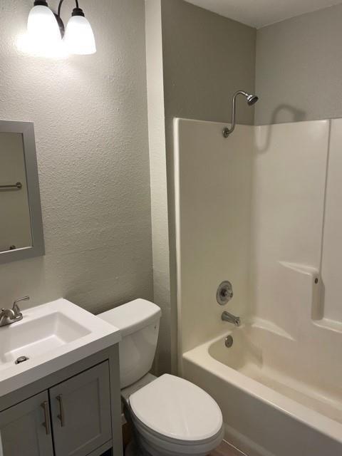 10616 Mellow Meadow Drive, Unit 43C Austin, TX 78750 - Photo 9 of 9 a bathroom with a sink a toilet and bathtub