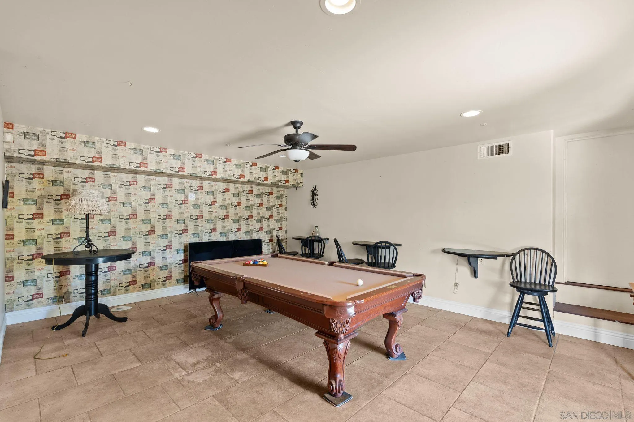 1035 Sleeping Indian Road Oceanside, CA 92057 - Photo 14 of 22 a room with furniture and a chandelier