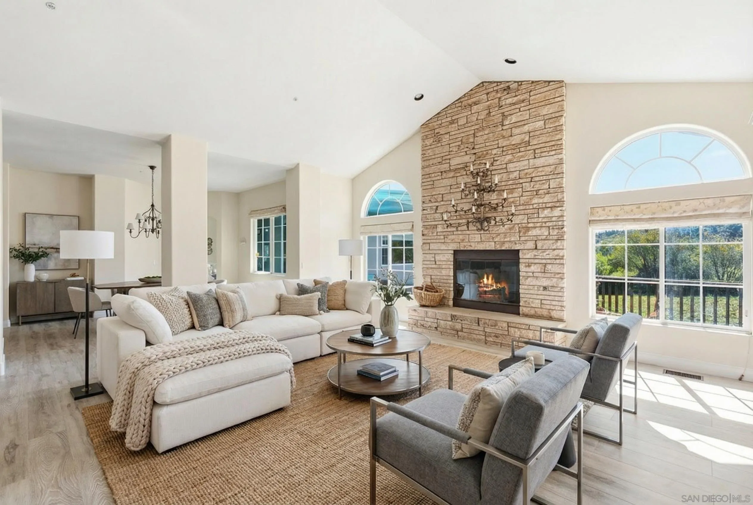 1035 Sleeping Indian Road Oceanside, CA 92057 - Photo 4 of 22 a living room with furniture large window and fireplace