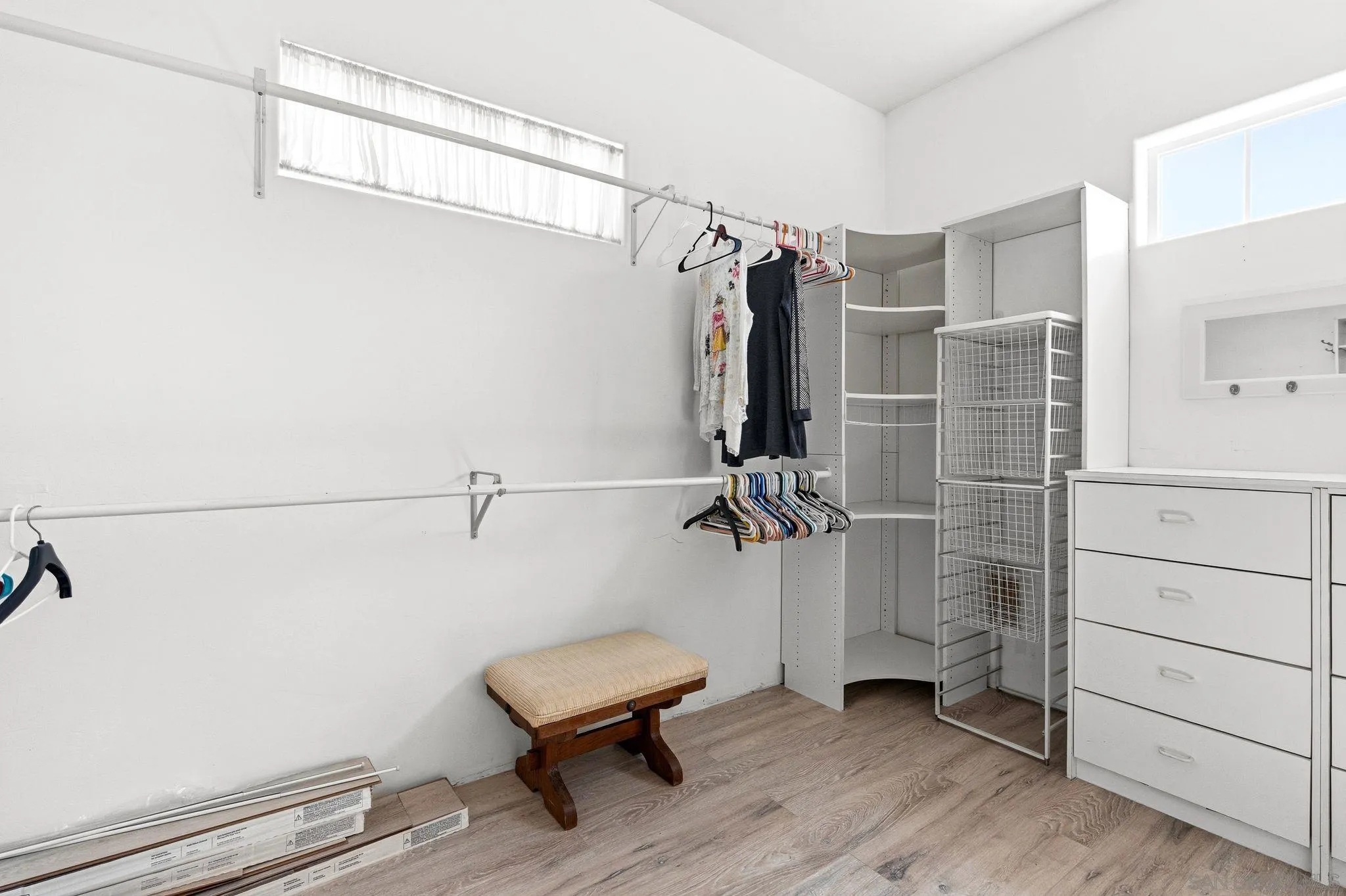 1035 Sleeping Indian Road Oceanside, CA 92057 - Photo 9 of 22 a view of a room with racks on the wall