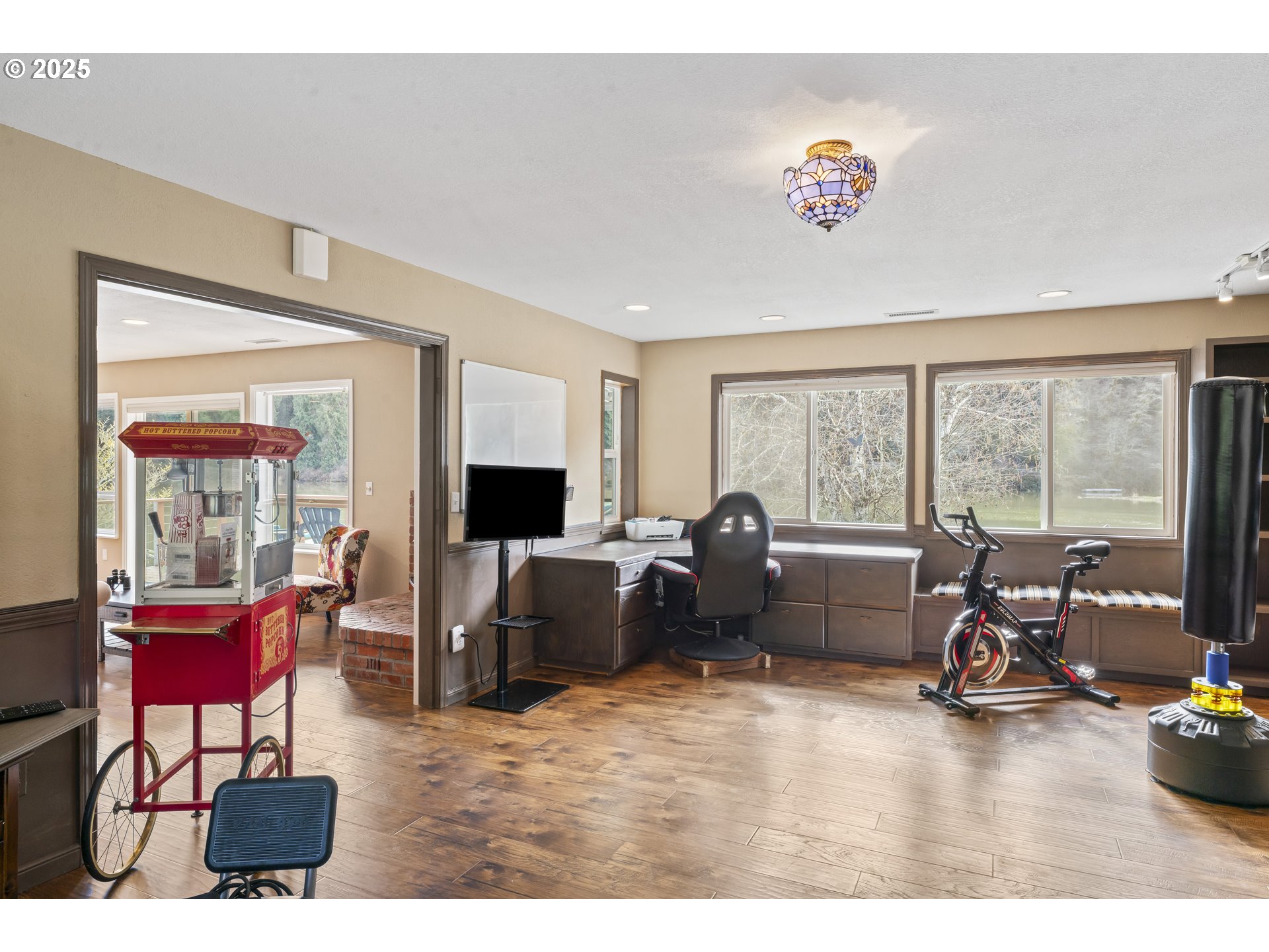 9202 Phey Lane Florence, OR 97439 - Photo 32 of 47 a living room with furniture and a large window