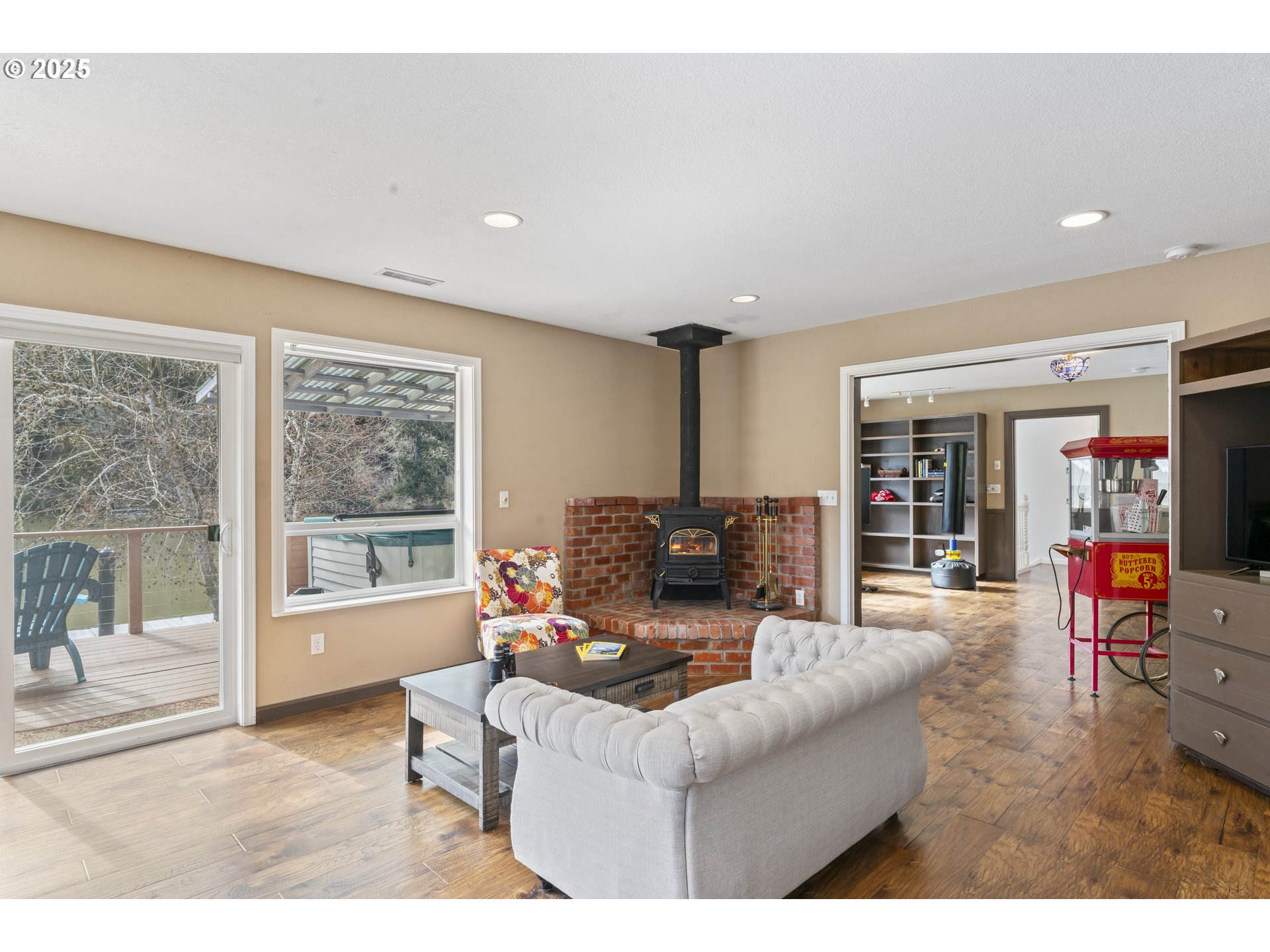 9202 Phey Lane Florence, OR 97439 - Photo 37 of 47 a living room with furniture and a large window